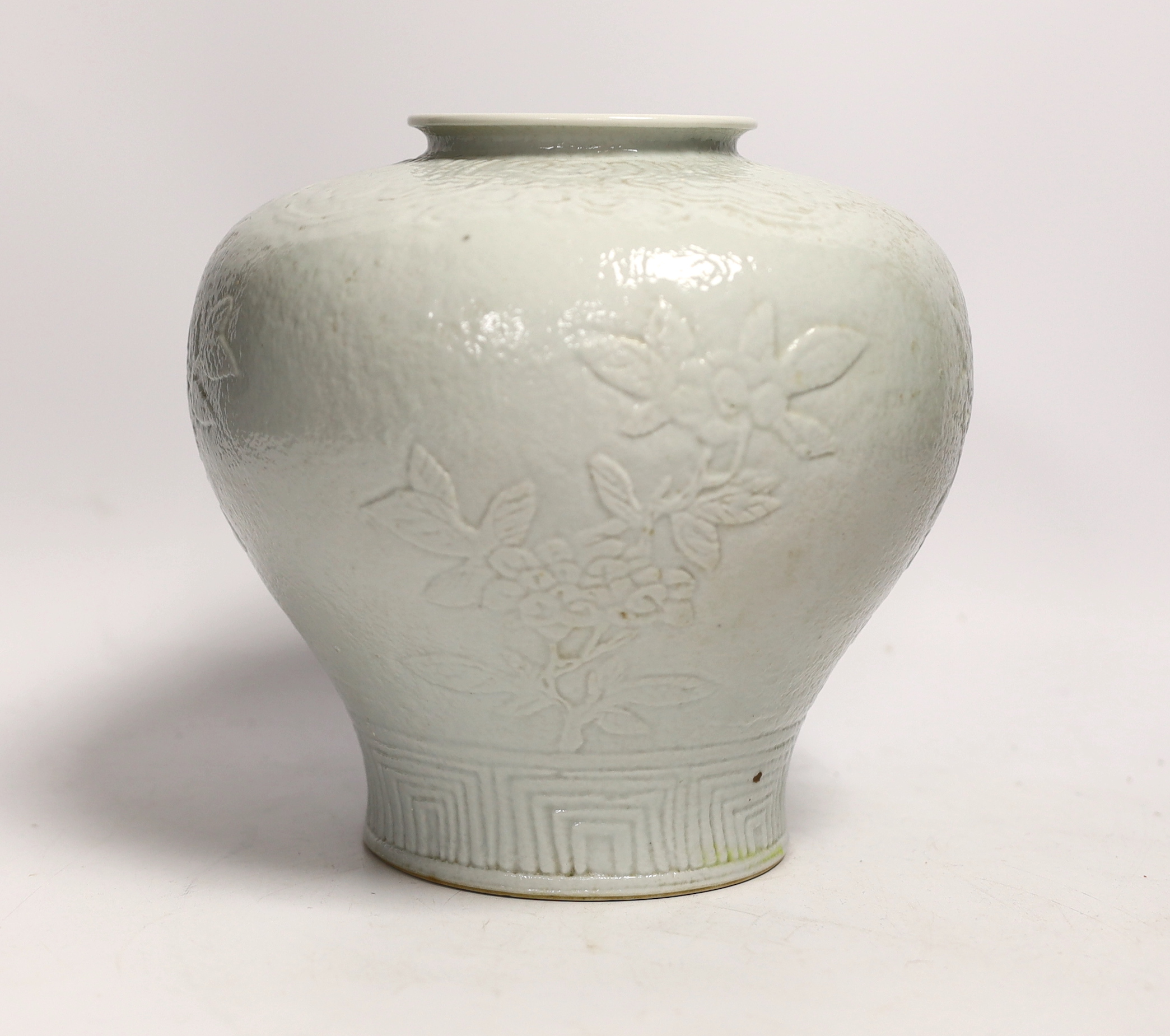 A Chinese moulded white porcelain meiping, Republic period, 20cm